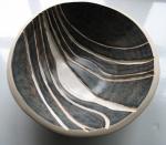Black bowl with lines image.